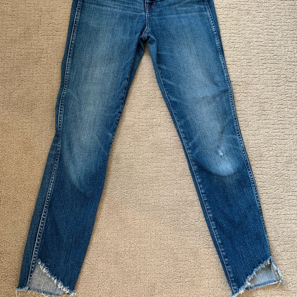 Tulip hem high waisted skinny denim.